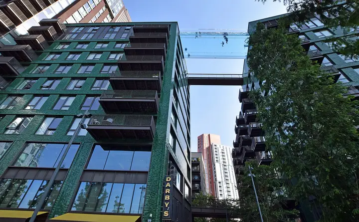 The transparent Sky Pool suspended between the two buildings at Embassy Gardens, Nine Elms